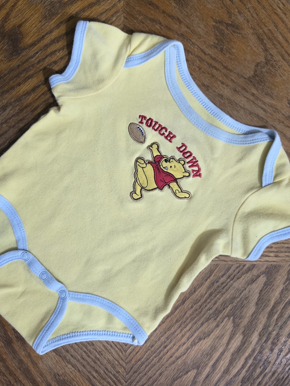 Vintage Disney Yellow & Light Blue Winnie the Pooh Touchdown One-Piece Bodysuit